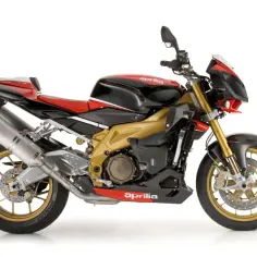 Sportowy motocykl Aprilia 1000 w kolorze czarno-czerwonym ze złotym silnikiem i felgami.
